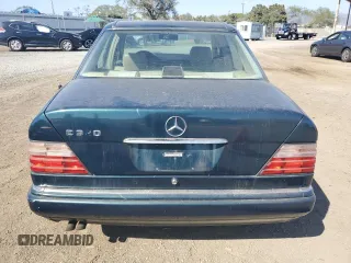 1995 Mercedes-Benz E Class with VIN WDBEA32E4SC205978, listed as a Copart auction lot 60329354 with 240,082 mi miles and Salvage Title. Bid and sale history available at carsss.com. Image 6.