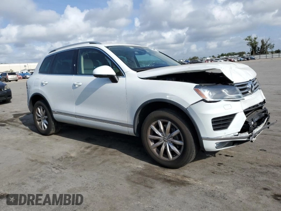 2017 Volkswagen Touareg Sport with VIN WVGEF7BP0HD006792, listed as a Copart auction lot 47895813 with 52,432 mi miles and . Bid and sale history available at DreamBid. Image 4.