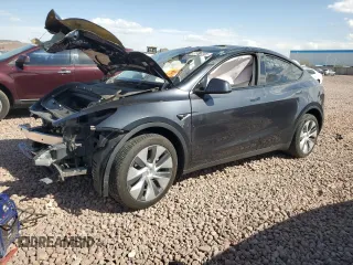 2024 Tesla Model Y Long Range z VIN 7SAYGDEE3RA225795, wystawiony jako Copart lot #51466005 z przebiegiem 14 327 mil mil oraz Szkoda całkowita • Salvage title. Historia ofert i sprzedaży dostępna na DreamBid. Obrazek 1.