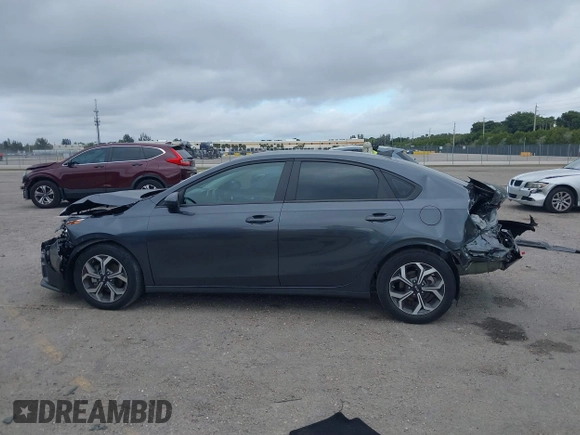 2021 Kia Forte FE z VIN 3KPF24AD0ME312622, wystawiony jako IAAI lot #41329338 z przebiegiem 29 722 mil mil oraz . Historia ofert i sprzedaży dostępna na DreamBid. Obrazek 14.