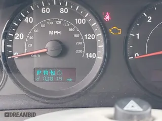 2005 Jeep Grand Cherokee Laredo with VIN 1J4GS48K45C677011, listed as a IAAI auction lot 41121018 with 210,814 mi miles. Bid and sale history available at carsss.com. Image 15.