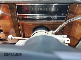1988 Cadillac Brougham z VIN 1G6DW51Y1J9731375, wystawiony jako Copart lot #55673625 z przebiegiem 91 741 mil mil oraz Szkody całkowita. Historia ofert i sprzedaży dostępna na DreamBid. Obrazek 9.