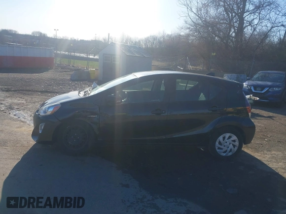 2016 Toyota Prius One z VIN JTDKDTB32G1124779, wystawiony jako IAAI lot #41855014 z przebiegiem 106 750 mil mil oraz . Historia ofert i sprzedaży dostępna na DreamBid. Obrazek 14.