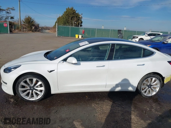 2019 Tesla Model 3 Long Range with VIN 5YJ3E1EB7KF442390, listed as a IAAI auction lot 41700122 with 65,539 mi miles. Bid and sale history available at carsss.com. Image 15.
