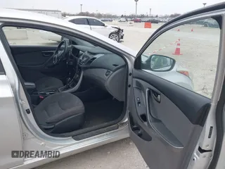 2016 Hyundai Elantra SE with VIN 5NPDH4AE7GH728956, listed as a IAAI auction lot 42060018 with 199,829 mi miles. Bid and sale history available at carsss.com. Image 5.