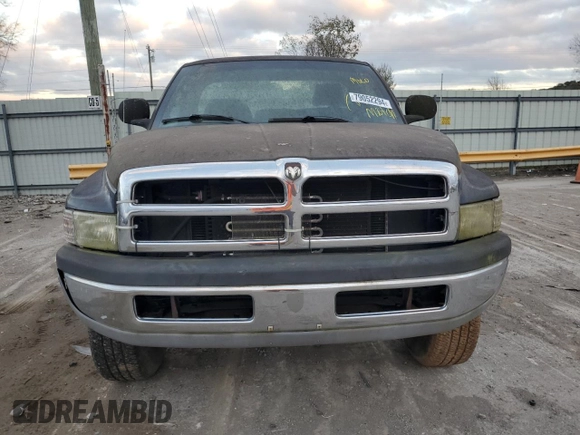 2001 Dodge 2500 z VIN 3B7KF26Z51M560104, wystawiony jako Copart lot #79052294 z przebiegiem Nie podano mil oraz Czysty tytuł • Clean title. Historia ofert i sprzedaży dostępna na DreamBid. Obrazek 5.