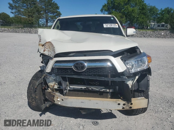 2010 Toyota 4Runner Trail with VIN JTEBU5JR7A5003159, listed as a Copart auction lot 52128125 with 227,274 mi miles and Salvage Title. Bid and sale history available at DreamBid. Image 5.