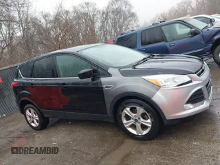 2014 Ford Escape SE with VIN 1FMCU0GX4EUE39511, listed as a IAAI auction lot 41477507 with 151,532 mi miles and . Bid and sale history available at DreamBid. Image 13.