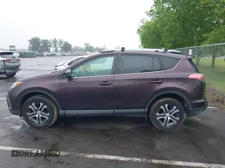 2018 Toyota RAV4 LE with VIN 2T3BFREV9JW857284, listed as a IAAI auction lot 42448480 with 85,551 mi miles and . Bid and sale history available at DreamBid. Image 14.