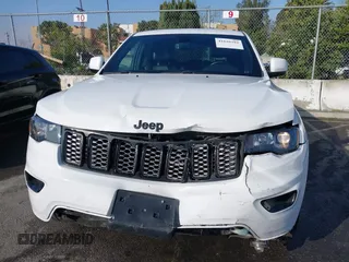 2020 Jeep Grand Cherokee Altitude with VIN 1C4RJEAG2LC306195, listed as a IAAI auction lot 41626392 with 45,587 mi miles and . Bid and sale history available at DreamBid. Image 13.