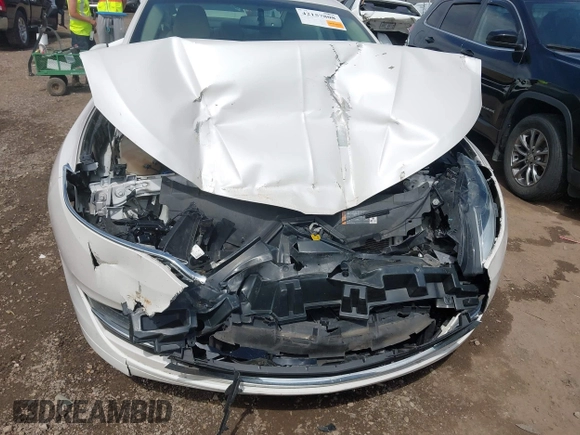 2016 Lincoln MKZ with VIN 3LN6L2G94GR633849, listed as a IAAI auction lot 42157808 with 118,678 mi miles and . Bid and sale history available at carsss.com. Image 6.