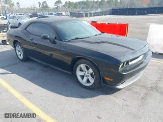 2013 Dodge Challenger Rallye Redline with VIN 2C3CDYAG3DH517925, listed as a IAAI auction lot 41774052 with 151,207 mi miles. Bid and sale history available at carsss.com. Image 1.