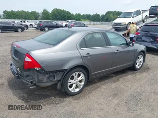 2012 Ford Fusion SE with VIN 3FAHP0HA9CR141588, listed as a IAAI auction lot 42485632 with 124,312 mi miles and . Bid and sale history available at DreamBid. Image 4.
