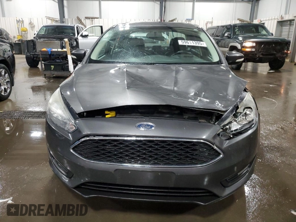 2016 Ford Focus SE z VIN 1FADP3F27GL216059, wystawiony jako Copart lot #59611395 z przebiegiem 170 468 mil mil oraz Szkoda całkowita • Salvage title. Historia ofert i sprzedaży dostępna na DreamBid. Obrazek 5.