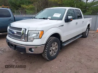 2011 Ford F-150 XL with VIN 1FTFW1EF5BFA08901, listed as a IAAI auction lot 42165617 with 310,898 mi miles and . Bid and sale history available at carsss.com. Image 2.