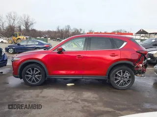 2018 Mazda CX-5 Grand Touring with VIN JM3KFBDM8J0406276, listed as a IAAI auction lot 41447355 with 70,772 mi miles. Bid and sale history available at carsss.com. Image 14.