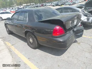 2004 Ford Police Interceptor Base w/3.27 Axle with VIN 2FAFP71W34X136279, listed as a IAAI auction lot 41945086 with 151,350 mi miles. Bid and sale history available at carsss.com. Image 3.