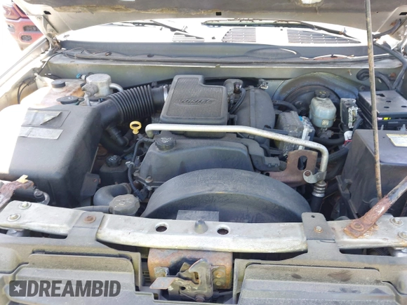 2004 GMC Envoy SLE with VIN 1GKDT13S042113411, listed as a IAAI auction lot 42117824 with 116,827 mi miles. Bid and sale history available at carsss.com. Image 10.