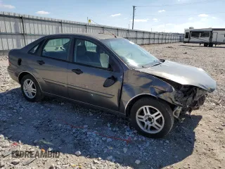 2004 Ford Focus SE with VIN 1FAFP34304W165468, listed as a Copart auction lot 45719985 with 208,259 mi miles and Salvage title. Bid and sale history available at DreamBid. Image 4.