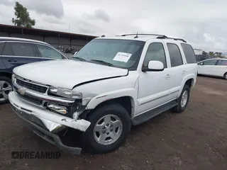 2004 Chevrolet Tahoe LS with VIN 1GNEC13T84J178237, listed as a IAAI auction lot 41742040 with 205,246 mi miles. Bid and sale history available at carsss.com. Image 2.