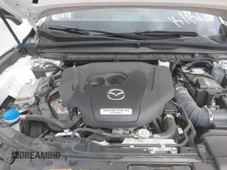 2024 Mazda CX-50 Premium z VIN 7MMVABDY8RN209081, wystawiony jako IAAI lot #42009149 z przebiegiem 18 369 mil mil oraz . Historia ofert i sprzedaży dostępna na DreamBid. Obrazek 10.