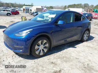 2021 Tesla Model Y Long Range with VIN 5YJYGAEE1MF207948, listed as a IAAI auction lot 41779570 with 100,859 mi miles. Bid and sale history available at carsss.com. Image 2.
