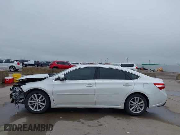 2014 Toyota Avalon Limited z VIN 4T1BK1EB6EU098479, wystawiony jako IAAI lot #42171736 z przebiegiem 92 290 mil mil oraz . Historia ofert i sprzedaży dostępna na DreamBid. Obrazek 15.