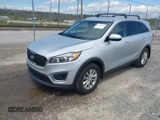 2016 Kia Sorento LX with VIN 5XYPG4A35GG048897, listed as a IAAI auction lot 41986578 with 161,157 mi miles. Bid and sale history available at carsss.com. Image 17.
