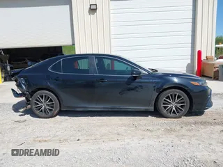 2022 Toyota Camry SE z VIN 4T1G11AK0NU657071, wystawiony jako IAAI lot #41991413 z przebiegiem 86 272 mil mil oraz . Historia ofert i sprzedaży dostępna na DreamBid. Obrazek 13.
