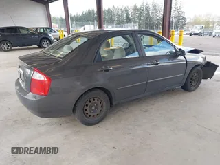 2004 Kia Spectra LX with VIN KNAFE121145031237, listed as a IAAI auction lot 41954550 with 133,744 mi miles. Bid and sale history available at carsss.com. Image 4.