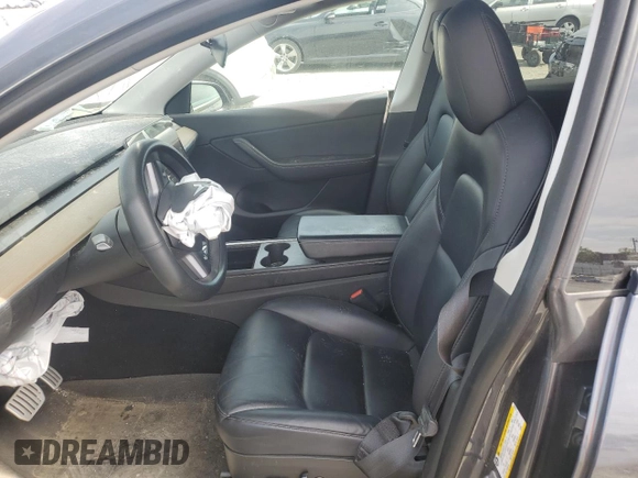 2021 Tesla Model Y Performance with VIN 5YJYGDEF2MF262273, listed as a Copart auction lot 50569245 with 90,879 mi miles and Salvage Title. Bid and sale history available at DreamBid. Image 7.