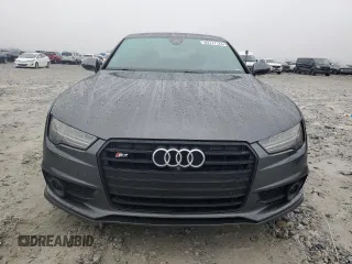 2016 Audi S7 with VIN WAUW2AFC0GN019847, listed as a Copart auction lot 83777124 with 103,009 mi miles and Salvage Title. Bid and sale history available at carsss.com. Image 5.