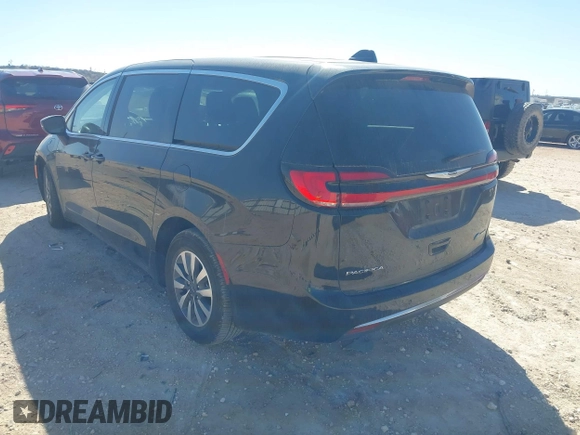 2023 Chrysler Pacifica Hybrid Touring L with VIN 2C4RC1L75PR611901, listed as a IAAI auction lot 41510935 with 44,156 mi miles and . Bid and sale history available at DreamBid. Image 3.