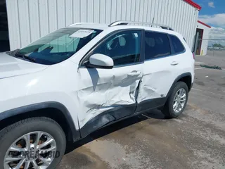 2019 Jeep Cherokee Latitude with VIN 1C4PJMCB6KD284293, listed as a IAAI auction lot 42597573 with 112,301 mi miles and . Bid and sale history available at DreamBid. Image 6.
