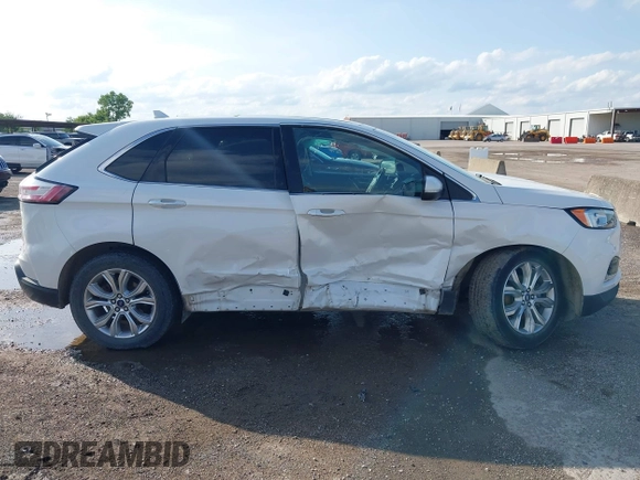 2020 Ford Edge Titanium z VIN 2FMPK3K98LBA42159, wystawiony jako IAAI lot #42358229 z przebiegiem 88 512 mil mil oraz . Historia ofert i sprzedaży dostępna na DreamBid. Obrazek 13.