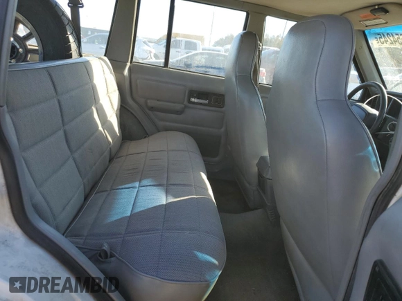 1996 Jeep Cherokee Sport with VIN 1J4FJ68S7TL325967, listed as a Copart auction lot 43654245 with 204,182 mi miles and Salvage Title. Bid and sale history available at carsss.com. Image 11.