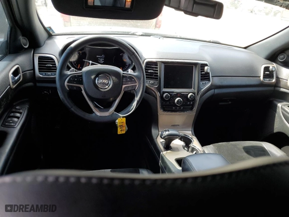 2015 Jeep Grand Cherokee Laredo with VIN 1C4RJFAG5FC724874, listed as a Copart auction lot 52462214 with 99,650 mi miles and Salvage Title. Bid and sale history available at carsss.com. Image 8.