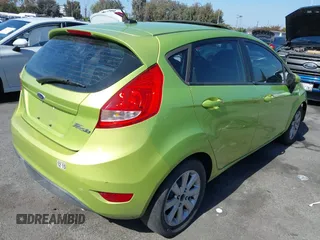 2011 Ford Fiesta SE z VIN 3FADP4EJ5BM138077, wystawiony jako IAAI lot #42506611 z przebiegiem Nie podano mil oraz . Historia ofert i sprzedaży dostępna na DreamBid. Obrazek 4.