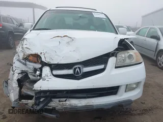 2004 Acura MDX Touring Pkg w/Navigation with VIN 2HNYD18874H545924, listed as a IAAI auction lot 41080740 with 343,574 mi miles. Bid and sale history available at carsss.com. Image 12.