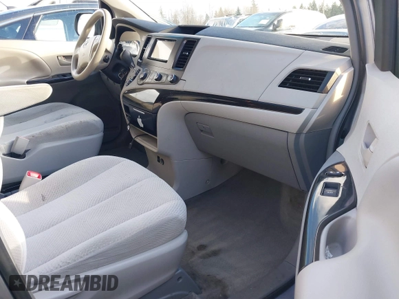 2012 Toyota Sienna with VIN 5TDKA3DC6CS015762, listed as a IAAI auction lot 41529216 with 219,136 mi miles and . Bid and sale history available at DreamBid. Image 5.