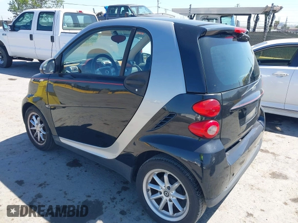 2008 Smart fortwo Pure with VIN WMEEJ31X78K180398, listed as a IAAI auction lot 42193886 with 98,136 mi miles and . Bid and sale history available at DreamBid. Image 3.
