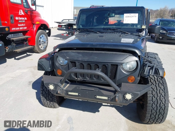2013 Jeep Wrangler Unlimited Sahara with VIN 1C4BJWEG3DL617511, listed as a IAAI auction lot 41842979 with 149,980 mi miles and . Bid and sale history available at DreamBid. Image 12.