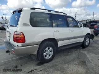 1999 Toyota Land Cruiser with VIN JT3HT05J7X0049786, listed as a Copart auction lot 45527005 with 199,447 mi miles and Salvage Title. Bid and sale history available at carsss.com. Image 3.
