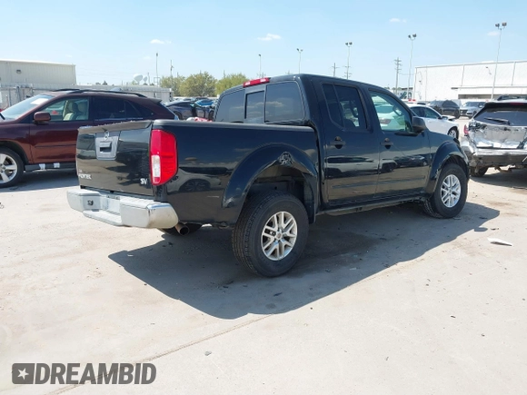 2014 Nissan Frontier SV with VIN 1N6AD0ER5EN745740, listed as a IAAI auction lot 41864104 with 161,303 mi miles and . Bid and sale history available at DreamBid. Image 4.