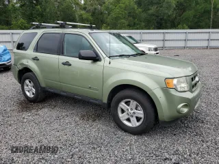 2009 Ford Escape Hybrid с VIN 1FMCU49339KC39089, выставлен на аукционе Copart как лот 56947025 с пробегом 145 098 миль миль и На запчасти • Non repairable. История ставок и продаж доступна на DreamBid. Изображение 4.