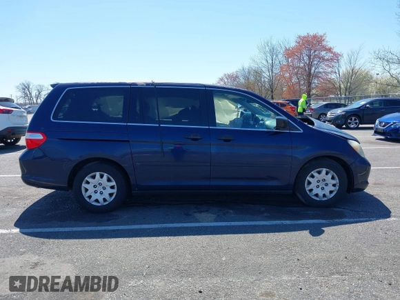 2007 Honda Odyssey LX with VIN 5FNRL38277B098798, listed as a IAAI auction lot 41998802 with 205,657 mi miles and . Bid and sale history available at carsss.com. Image 13.