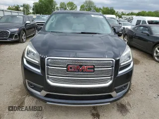 2014 GMC Acadia Denali z VIN 1GKKVTKD5EJ361077, wystawiony jako Copart lot #58598415 z przebiegiem 157 966 mil mil oraz Czysty tytuł • Clean title. Historia ofert i sprzedaży dostępna na DreamBid. Obrazek 5.