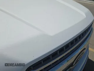 2018 Ford F-150 XL with VIN 1FTEW1E59JKD11351, listed as a IAAI auction lot 42663848 with 128,761 mi miles and . Bid and sale history available at DreamBid. Image 4.