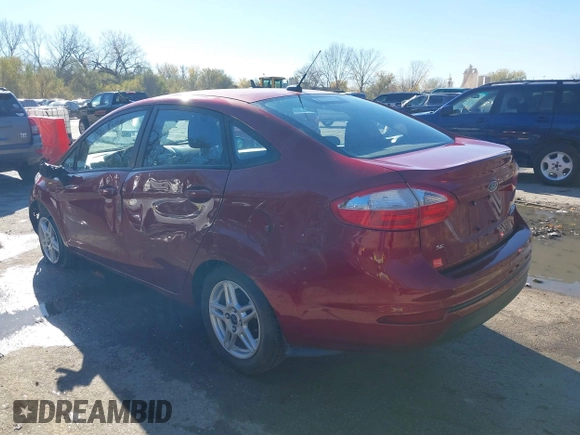 2017 Ford Fiesta SE z VIN 3FADP4BJ6HM143379, wystawiony jako IAAI lot #40863748 z przebiegiem 77 325 mil mil oraz . Historia ofert i sprzedaży dostępna na DreamBid. Obrazek 3.