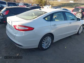 2013 Ford Fusion SE Hybrid with VIN 3FA6P0LU9DR375403, listed as a IAAI auction lot 40995125 with 132,583 mi miles. Bid and sale history available at carsss.com. Image 4.